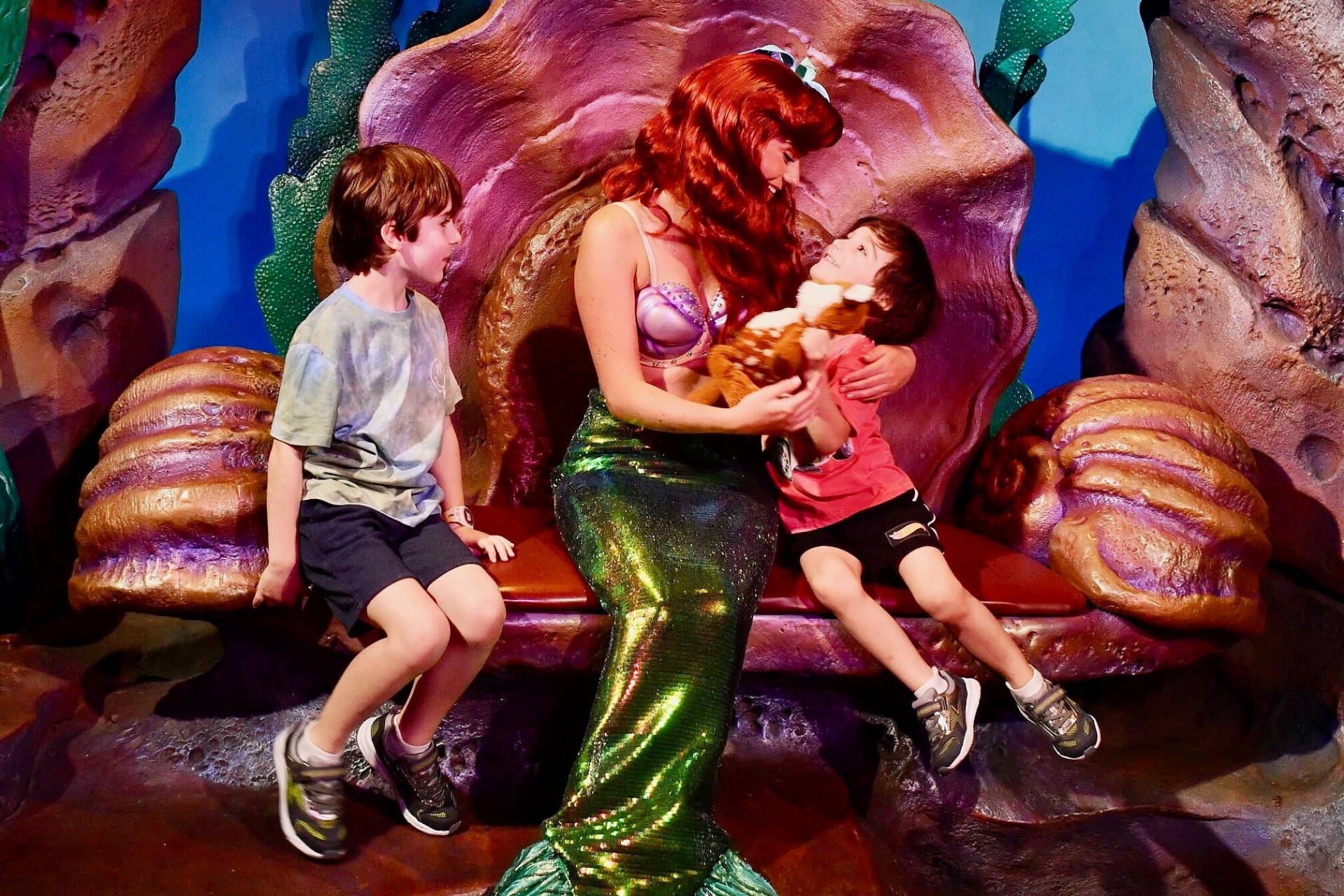 Kids meeting Ariel in her grotto