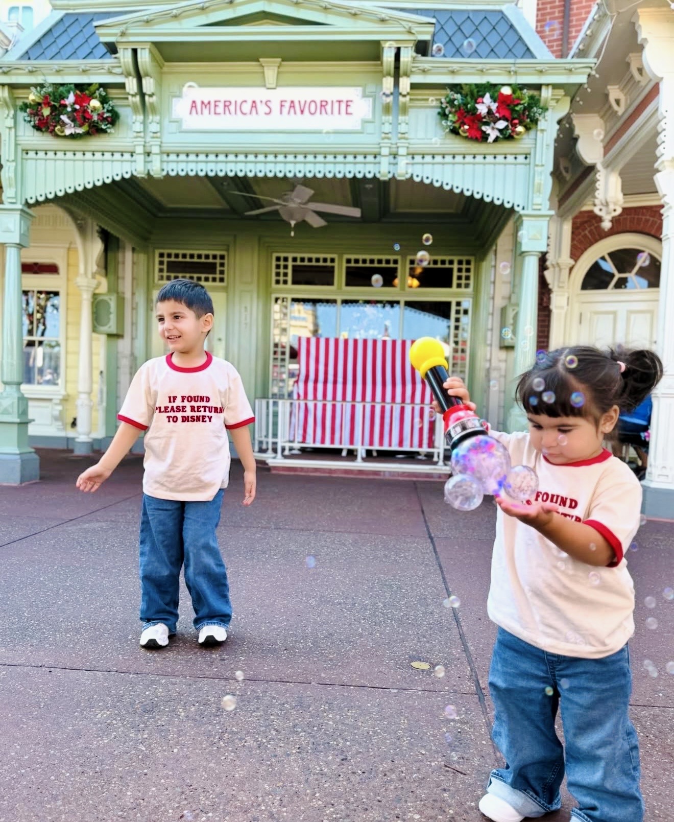 Kids blowing bubbles on Main Street
